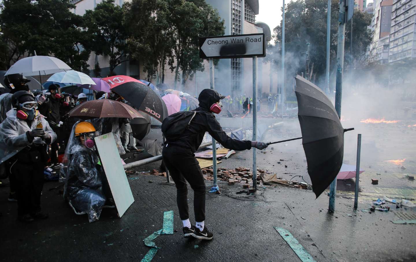 Protester with umbrella Protester with umbrella