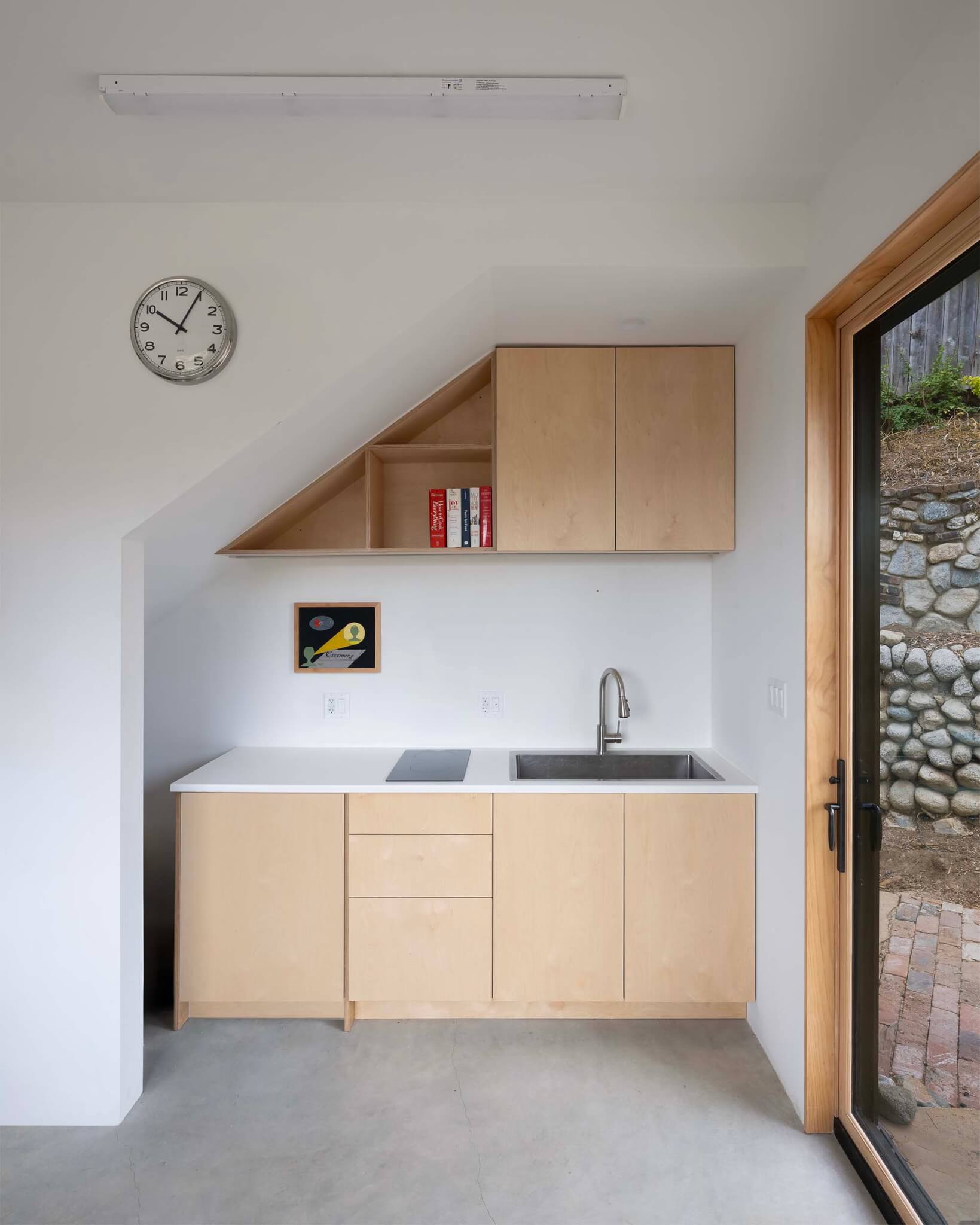 wood cabinets and white walls