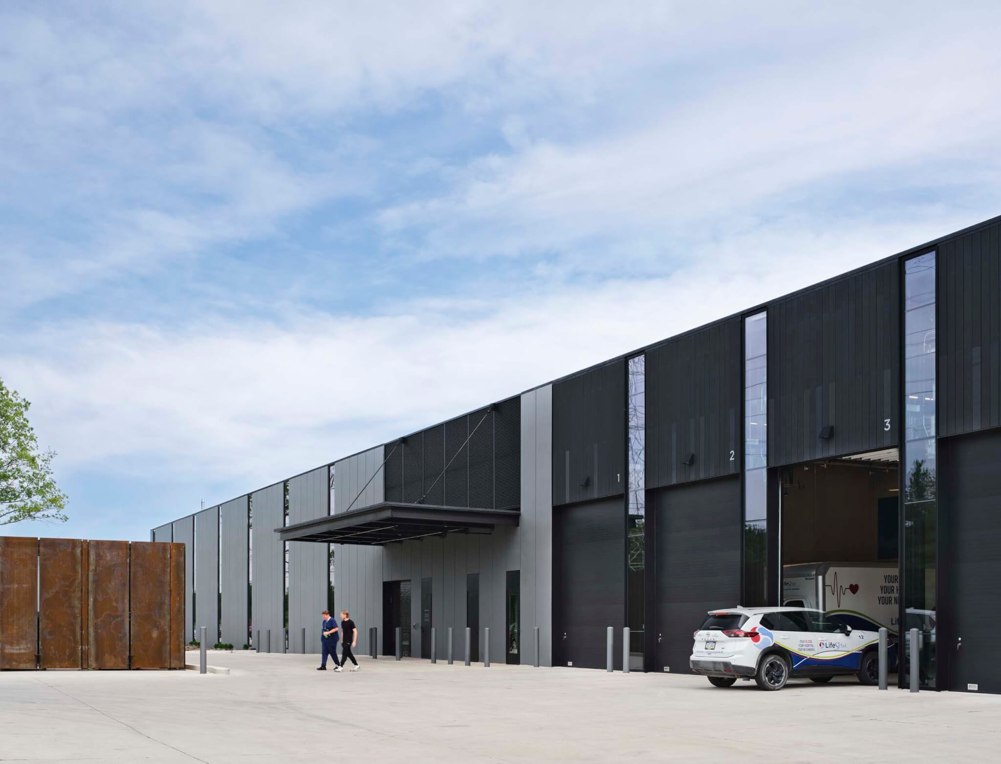 the garage bays at lifeserve headquarters designed by bnim
