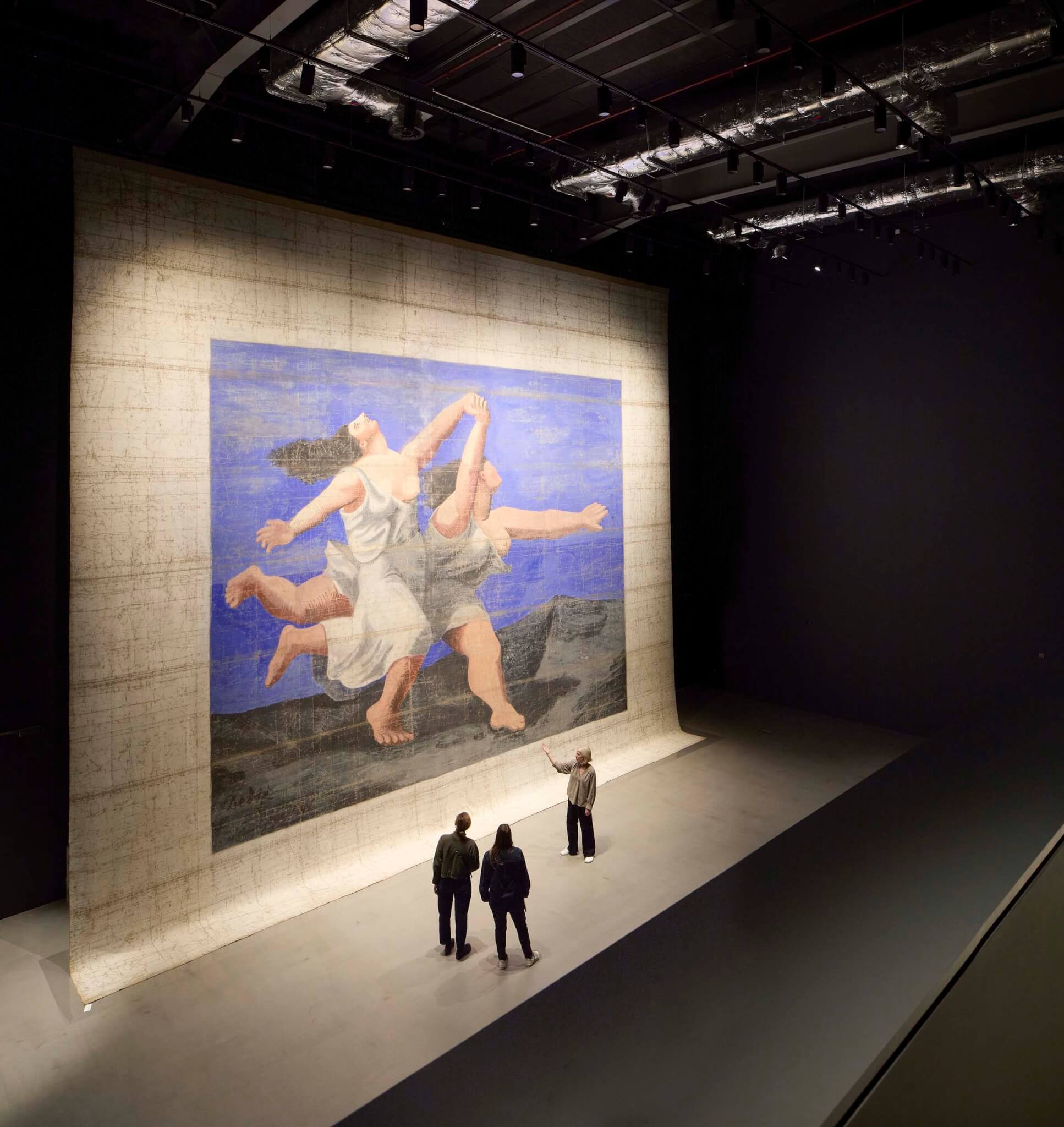 large stage cloth exhibited on wall