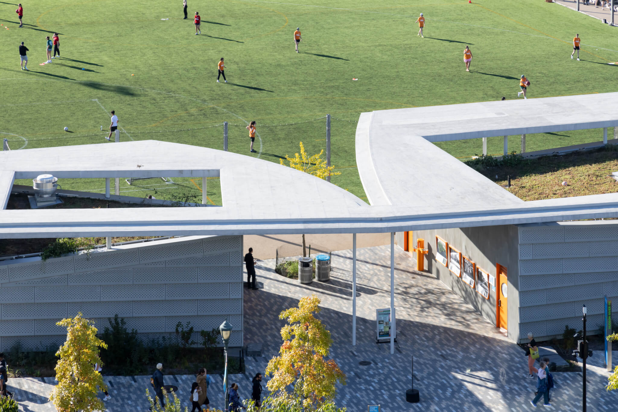 an arial view of the roof framing the soccer field at Gansevoort Park Pavilion
