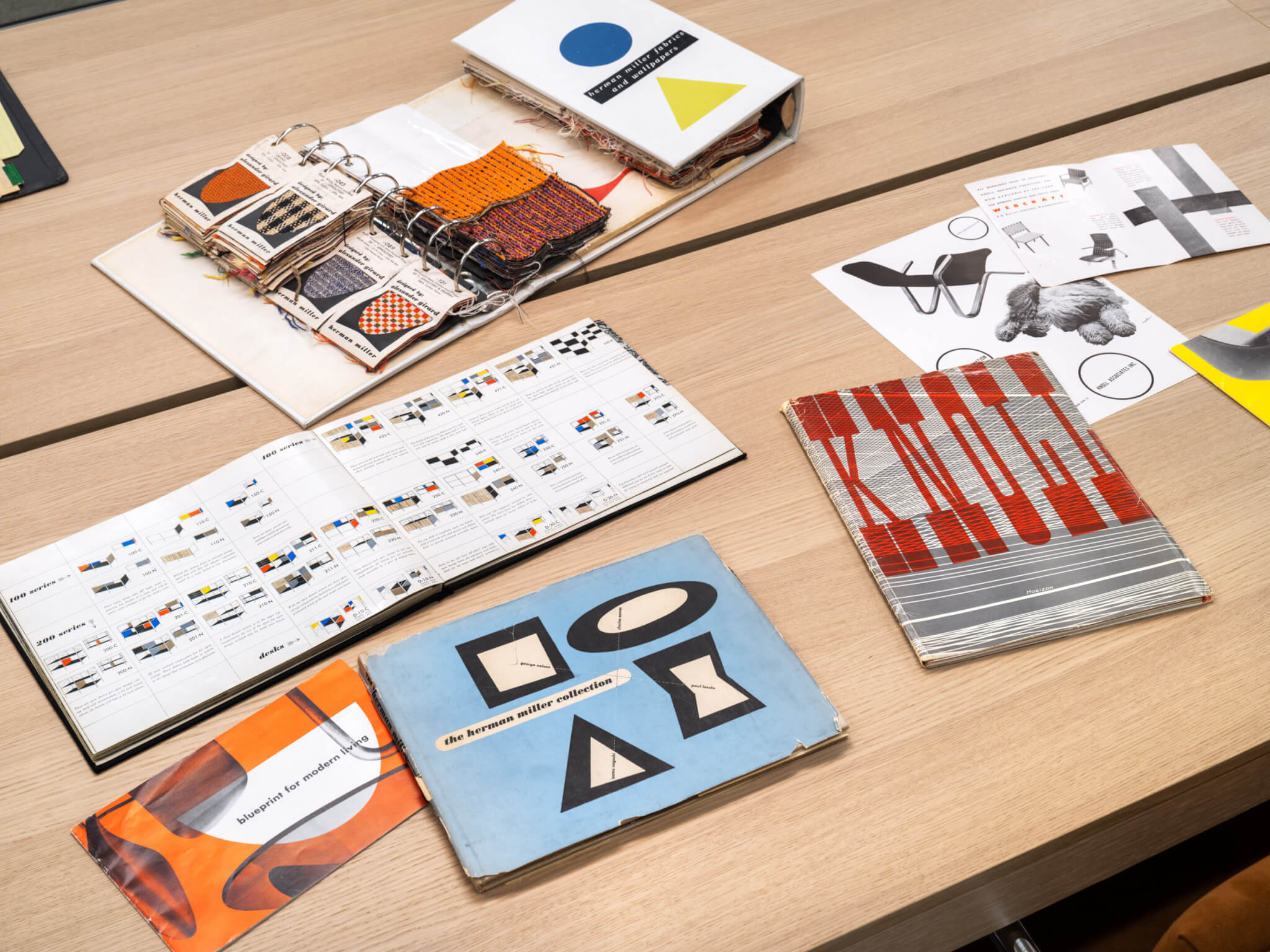 Books and textiles on wood table