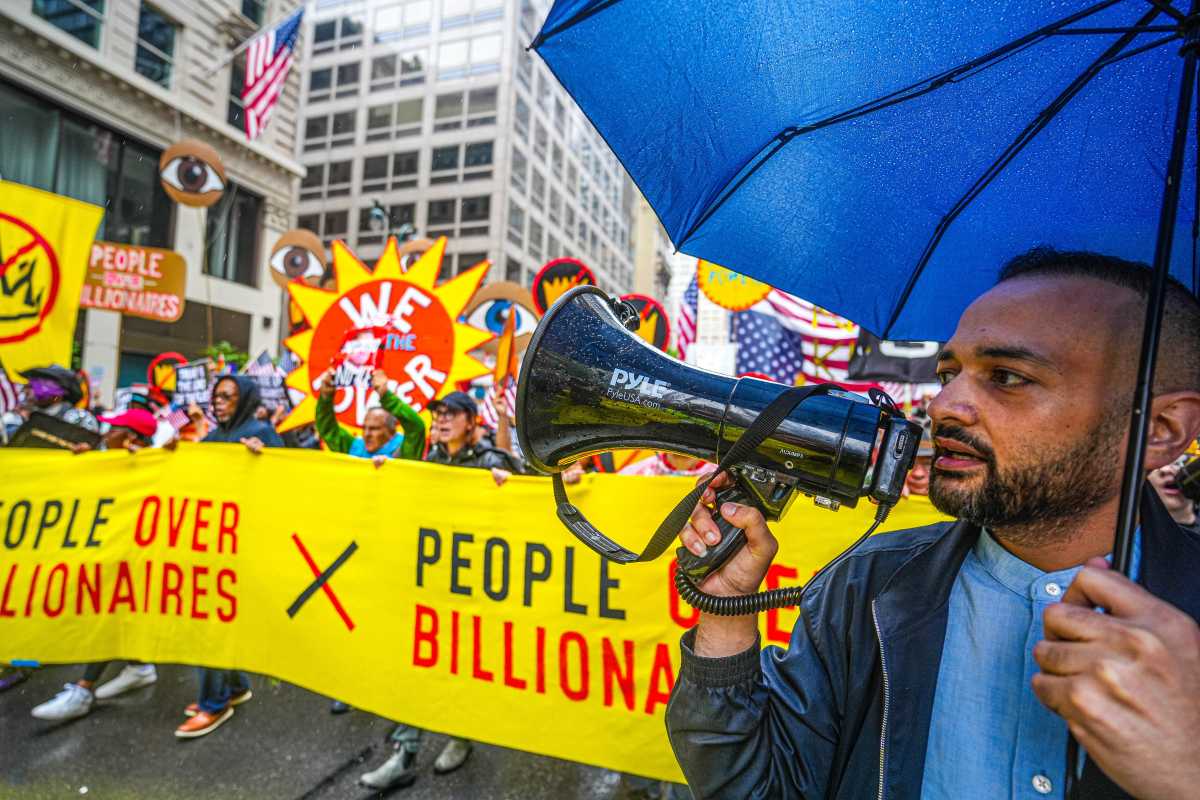 NO KINGS DAY: Tens of thousands hit NYC streets to protest Trump, autocracy and deportations 4 Man uses bullhorn during No Kings Day march