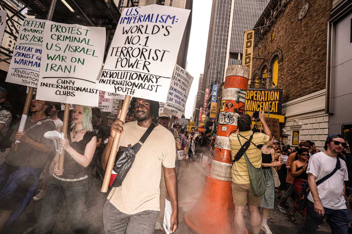 Trump strikes Iran: Hundreds take to the streets of Midtown Manhattan to protest unilateral bombings 4