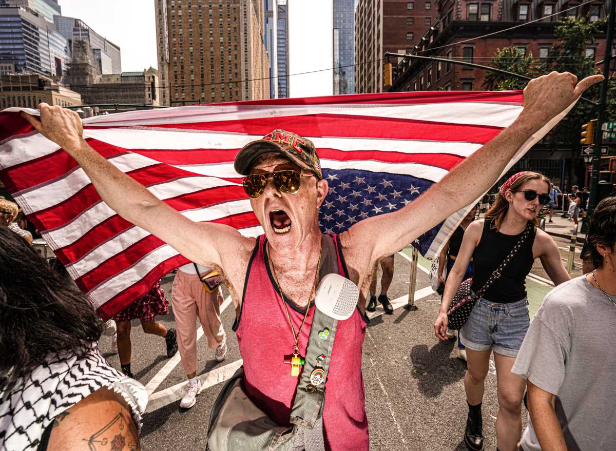 Trump strikes Iran: Hundreds take to the streets of Midtown Manhattan to protest unilateral bombings 6