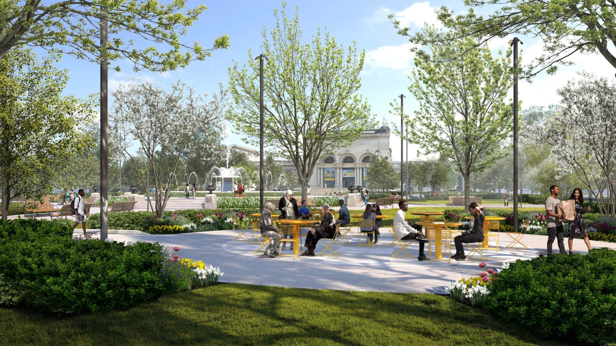 paved plaza with yellow chairs