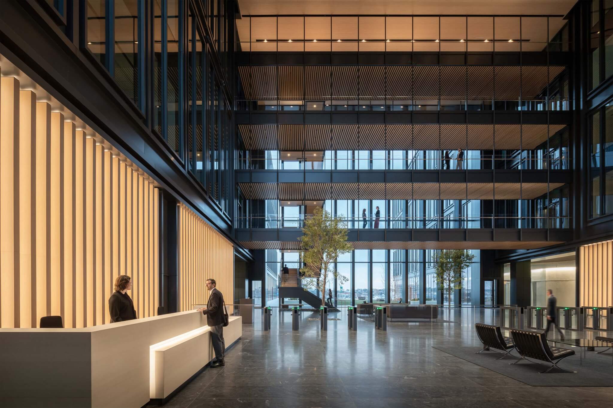 he spacious lobby, allowing workers to traverse between the two office volumes