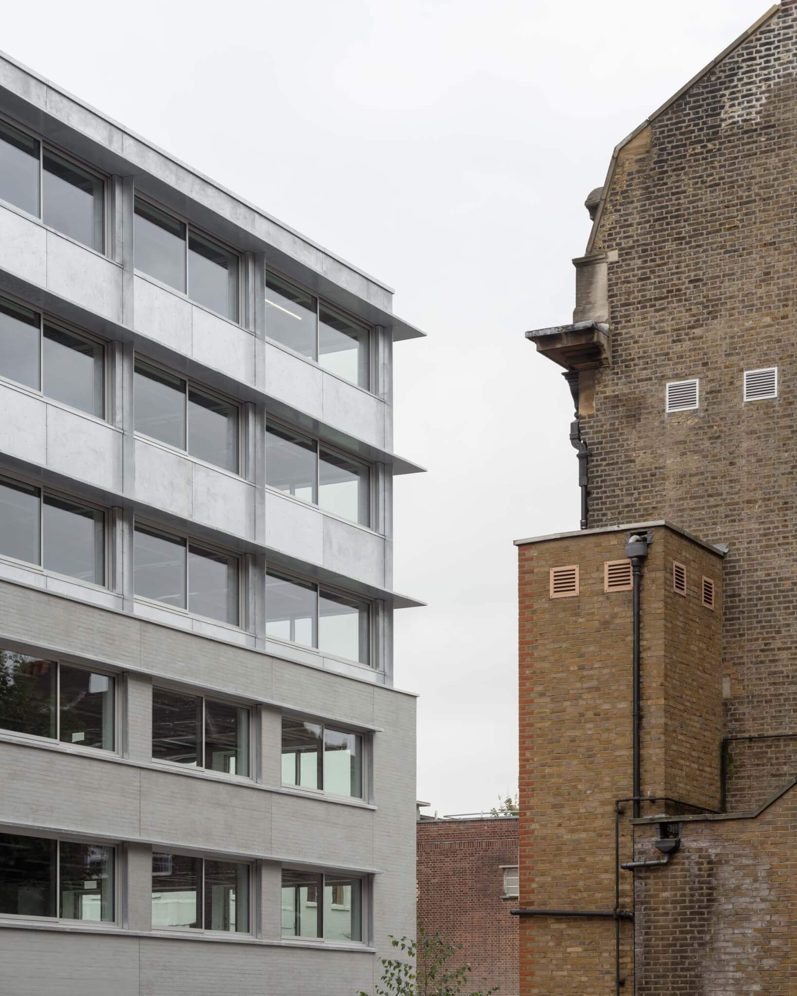 3-story addition clad in galvanized steel 