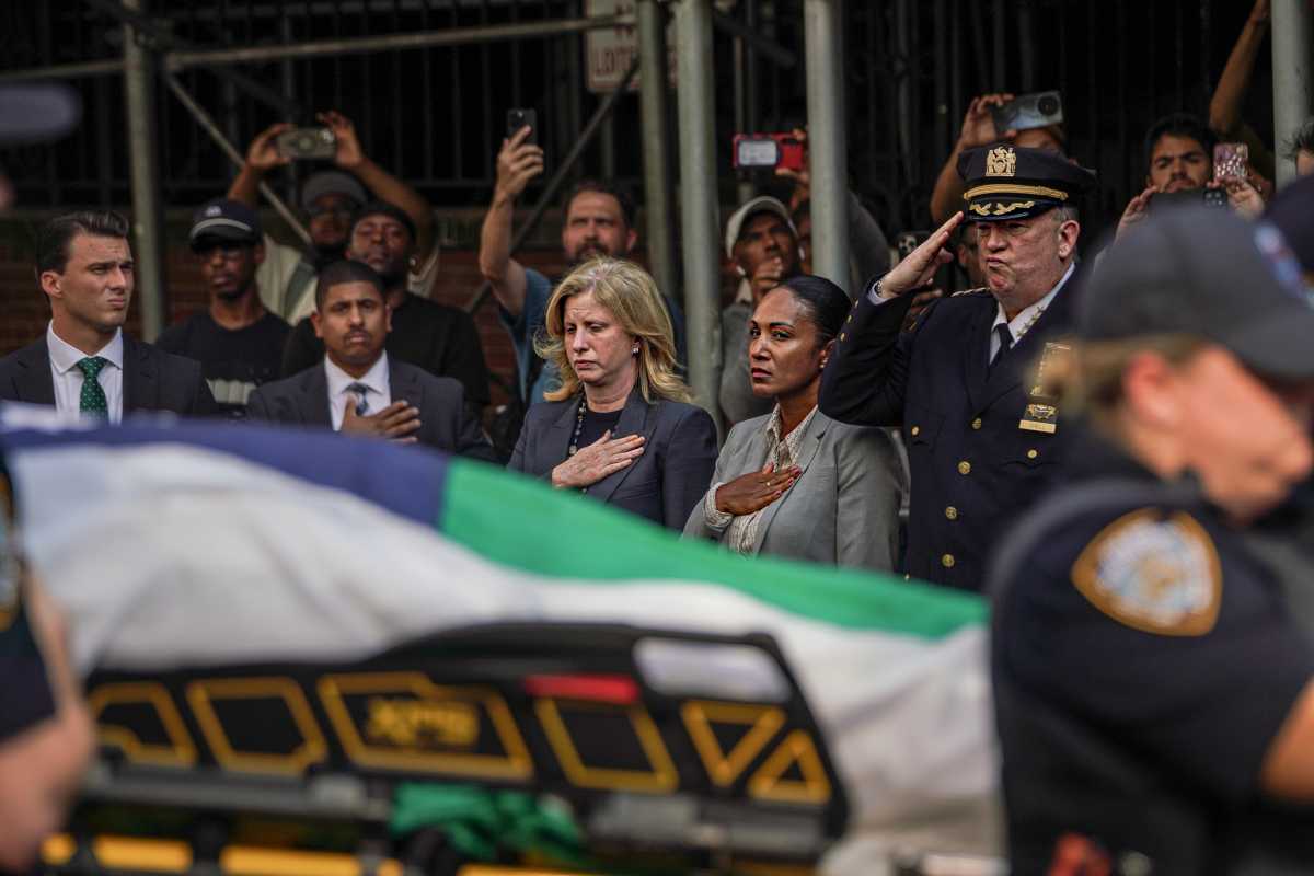 Body of slain Bronx cop killed in Midtown mass shooting released to his family as funeral rites begin 2