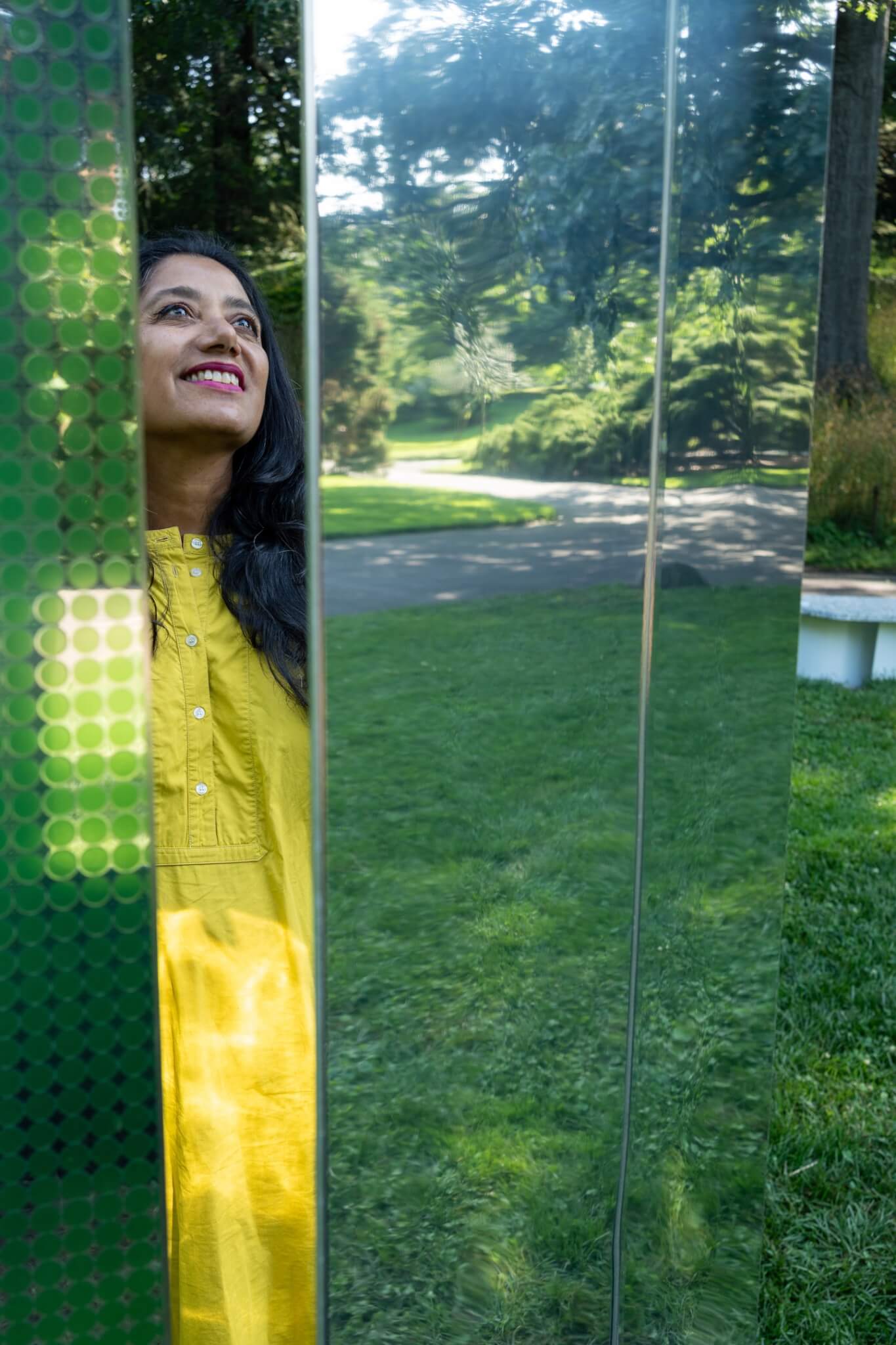 Suchi Reddy surrounded by mirrors