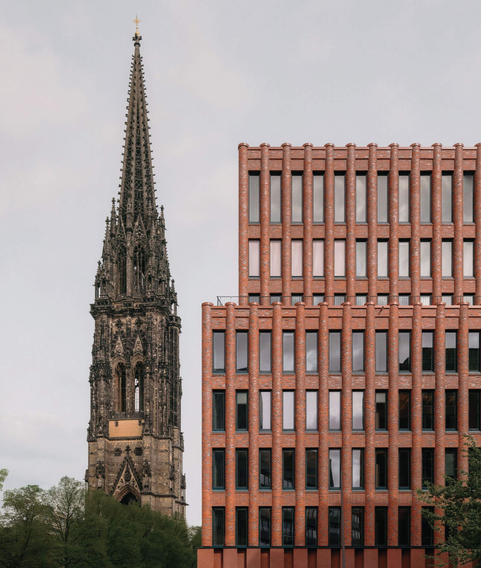 facade detail and nearby church spire