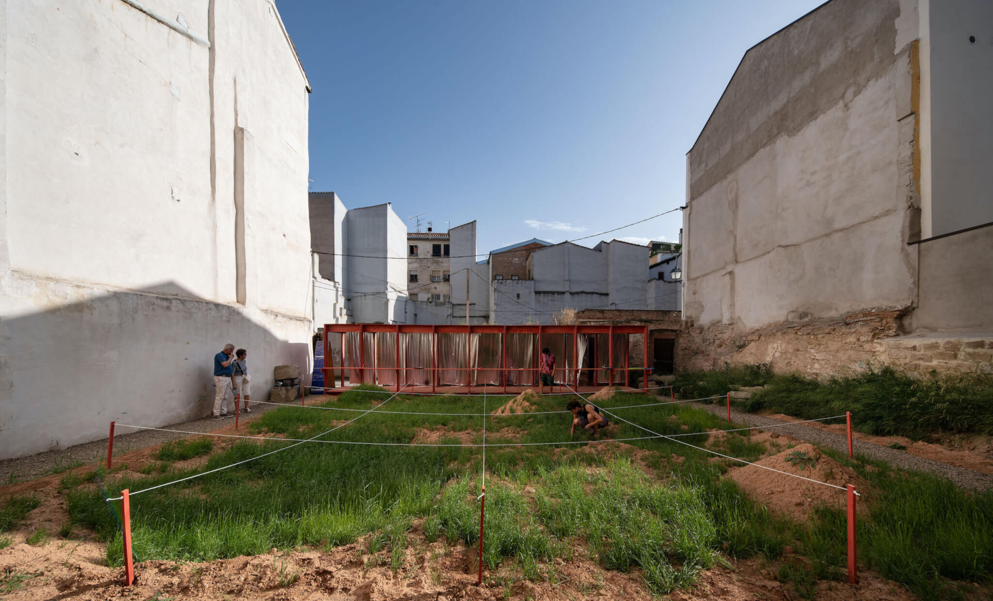 Vast green lot with veranda