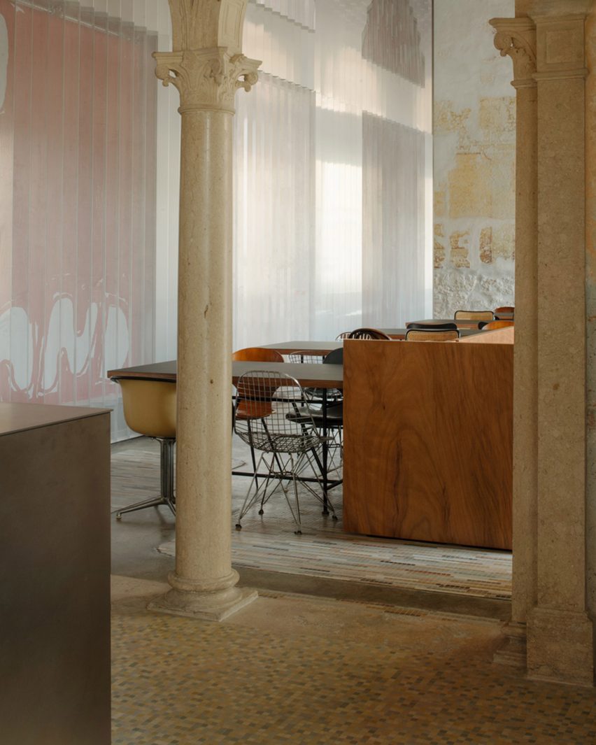 Seating area of cafe in Arzignano, Italy, by AMAA