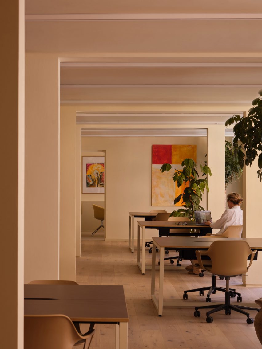 Office interior with artwork and plants