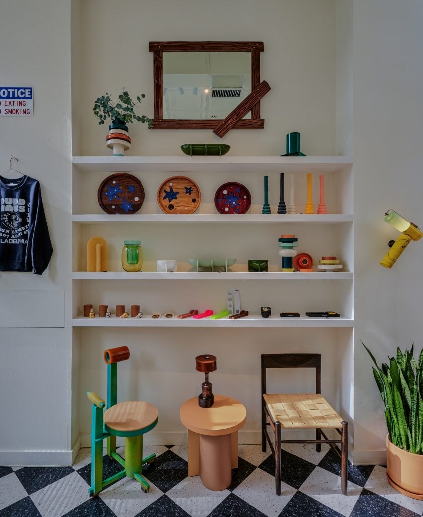 Display of seating and small objects on shelves