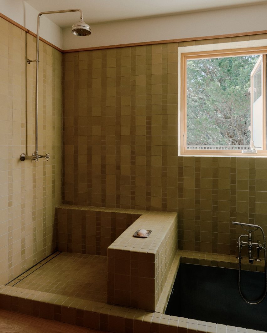 Bathroom with sunk steel bath