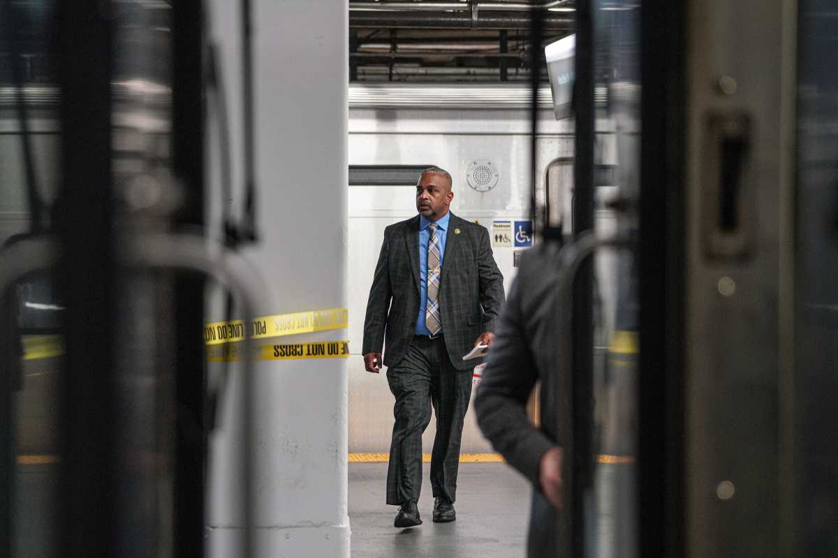 NYPD detective investigates police shooting at Penn Station near LIRR trains