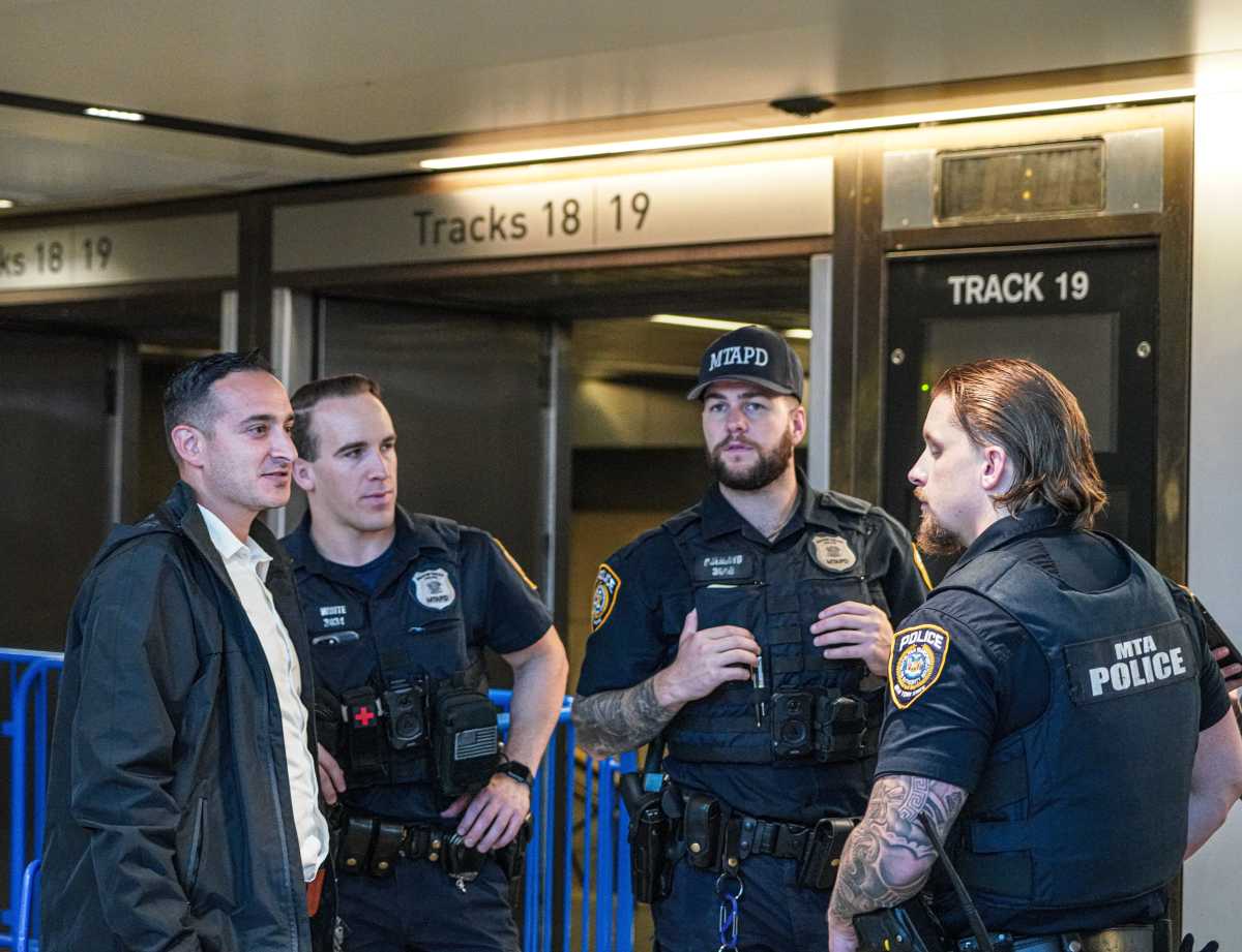 police at Penn Station near scene of police shooting