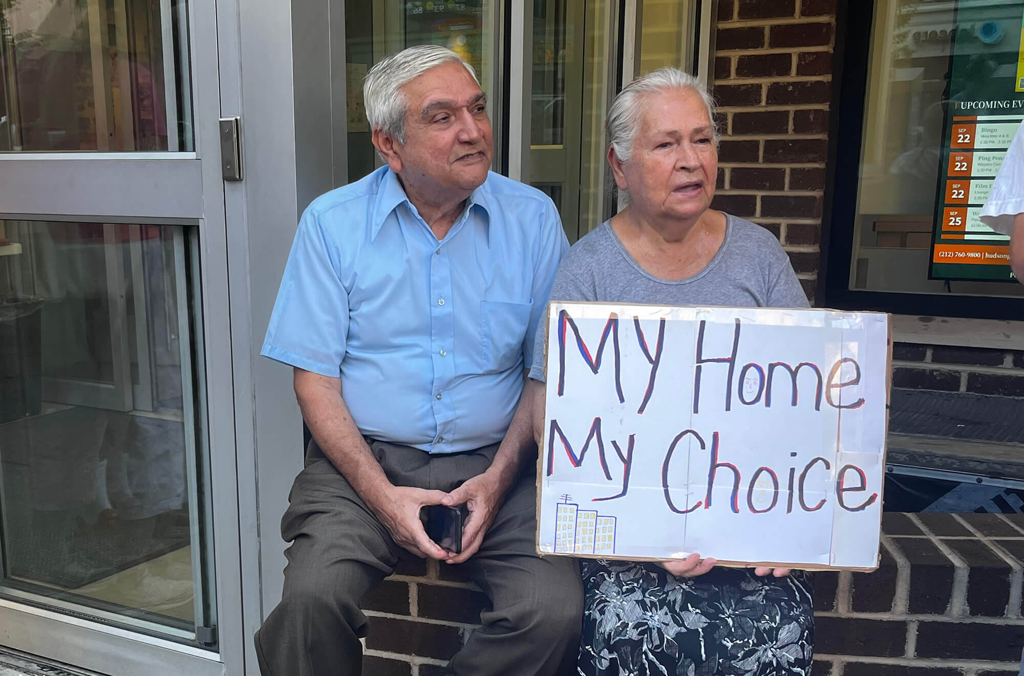 Protesters at a rally outside the Fulton Senior Center in Chelsea