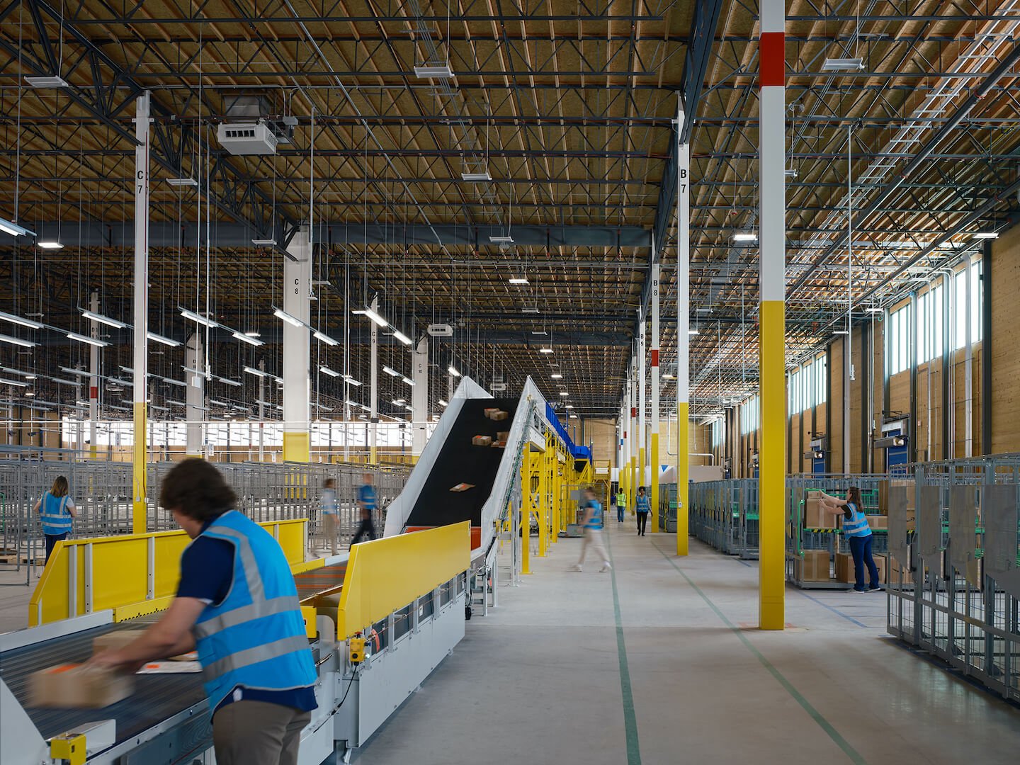 Interior of Amazon delivery station with conveyor belt
