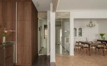 Weinbenami “maintains soul” of modernist Antwerp apartment in delicate overhaul