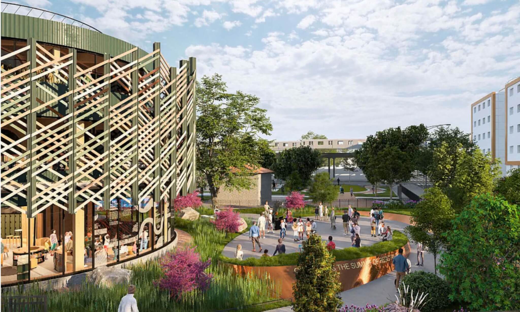 outdoor area next to big cool building with green landscape in center