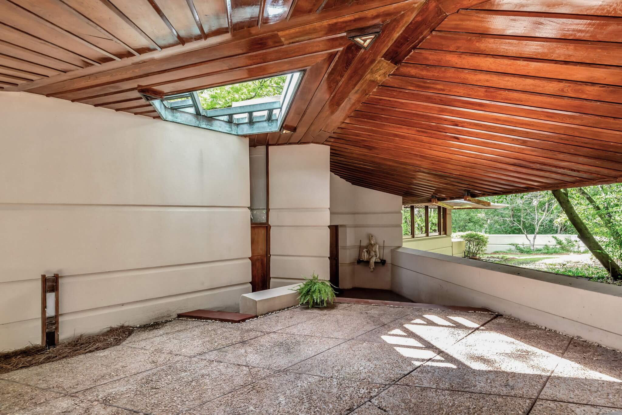 House entryway with wood canopy