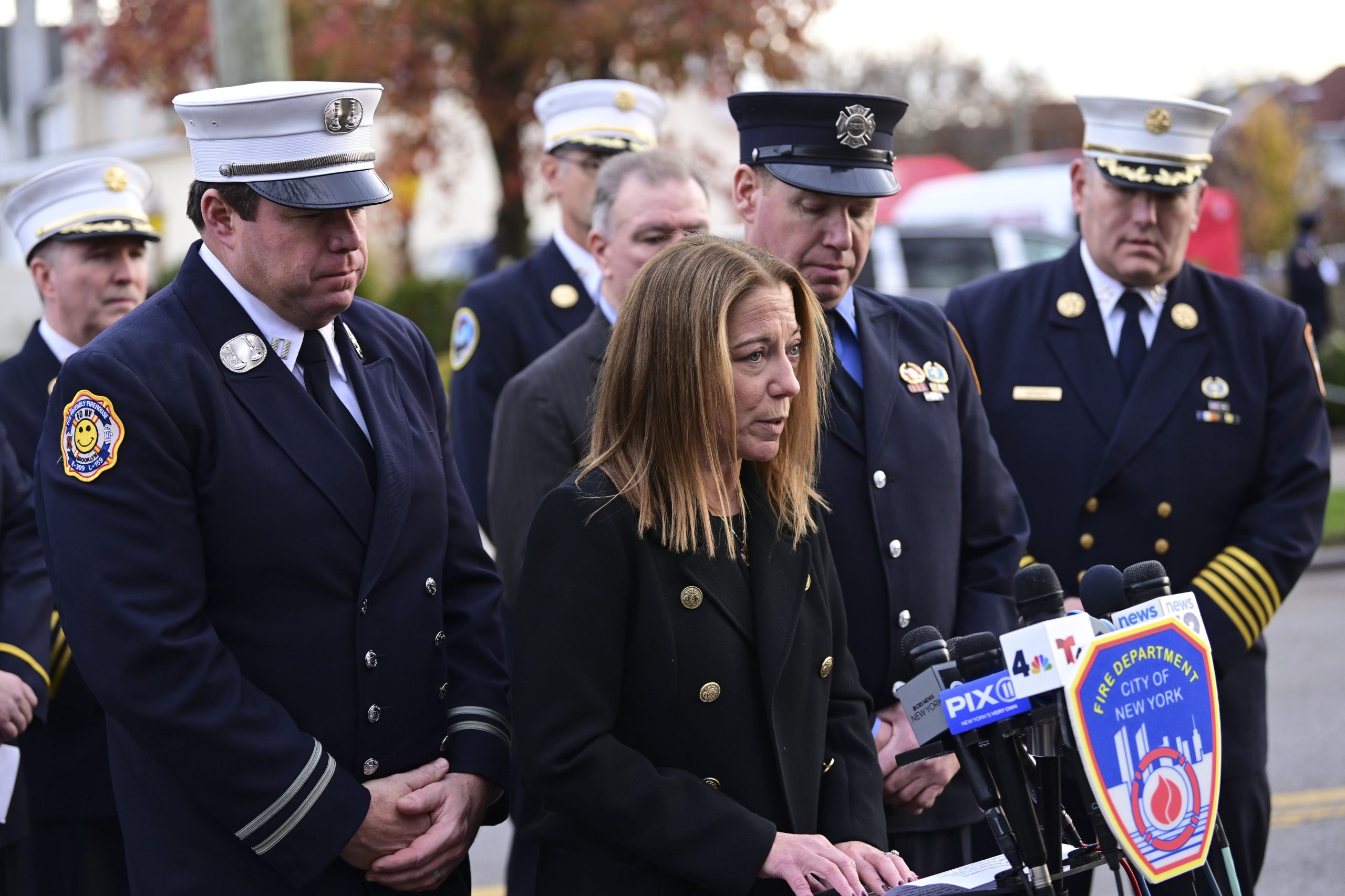 Friends and family pay tribute to fallen firefighter Patrick Brady at Brooklyn wake 2 Brady's wife, Kara, addresses the crowd.