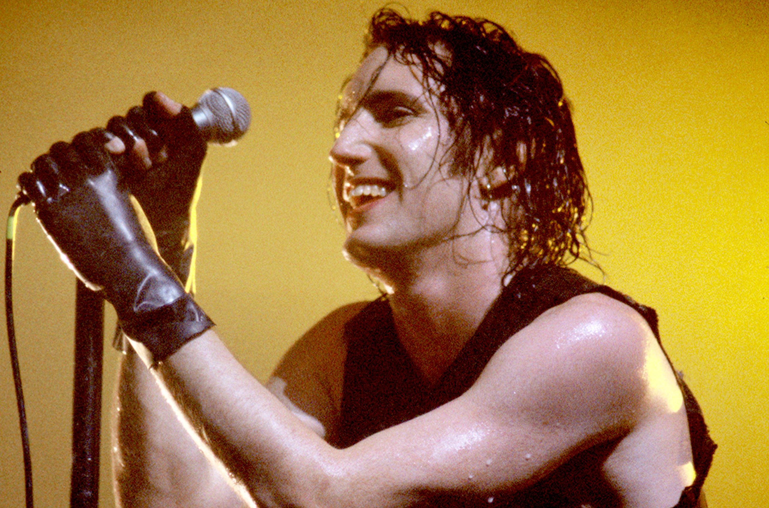 Trent Reznor of Nine Inch Nails performs in 1994. (Credit: Tim Mosenfelder/Getty Images)