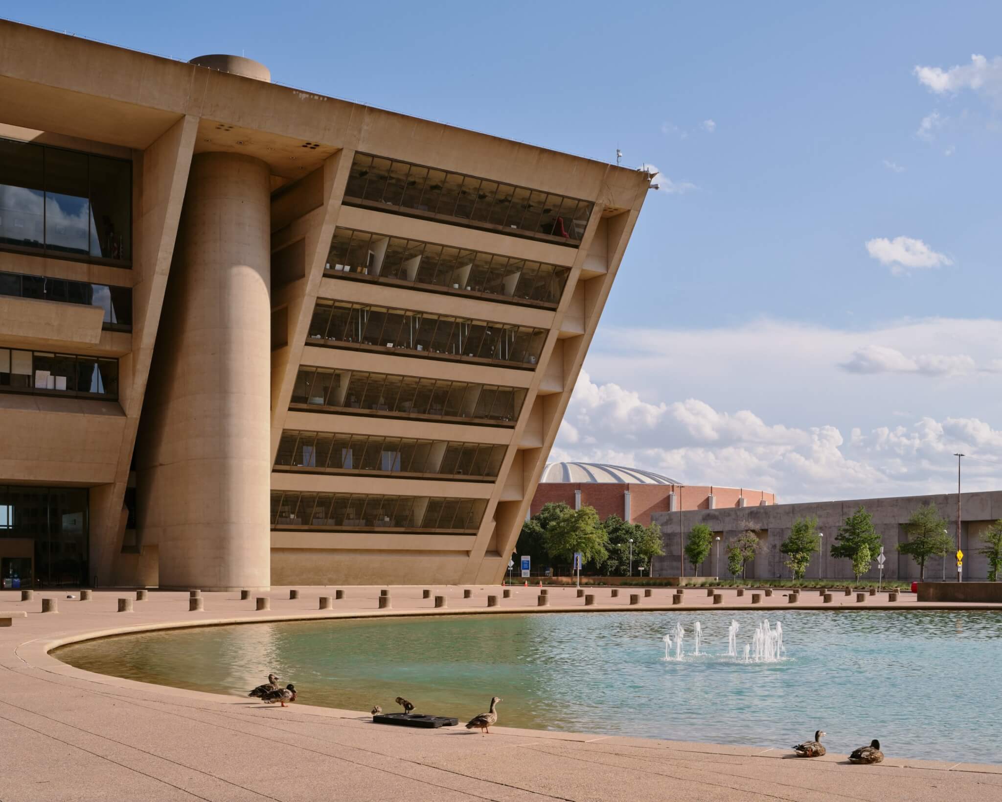 Exterior of Dallas City Hall with fountain in the foreground