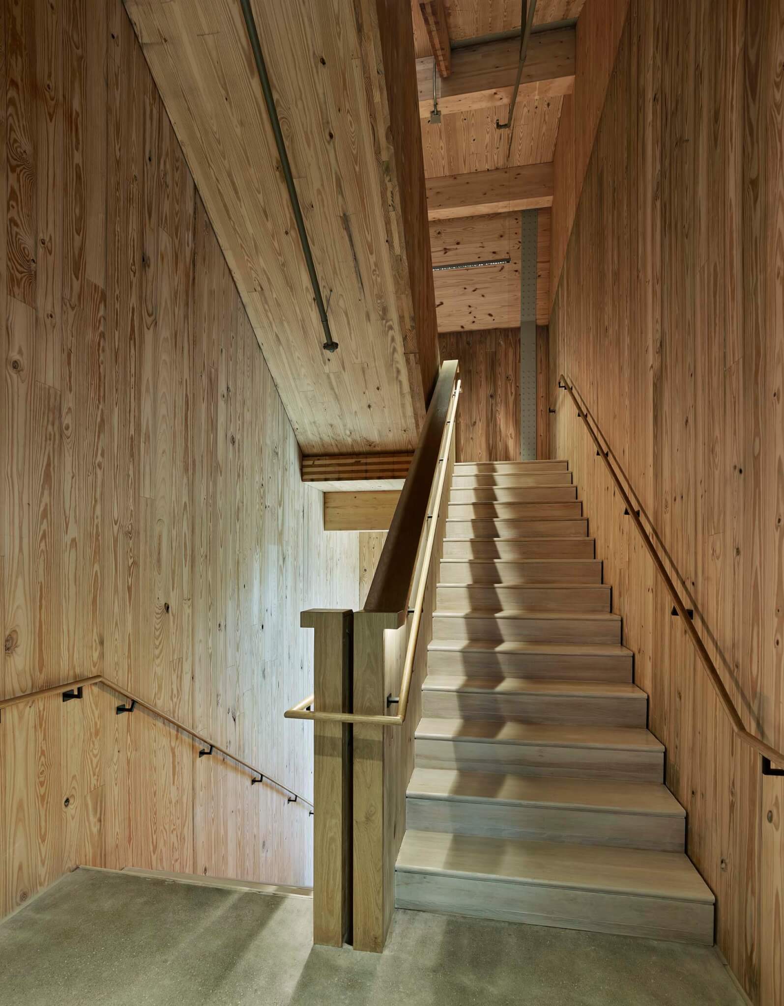 wood staircase and wall in anthony timberlands center