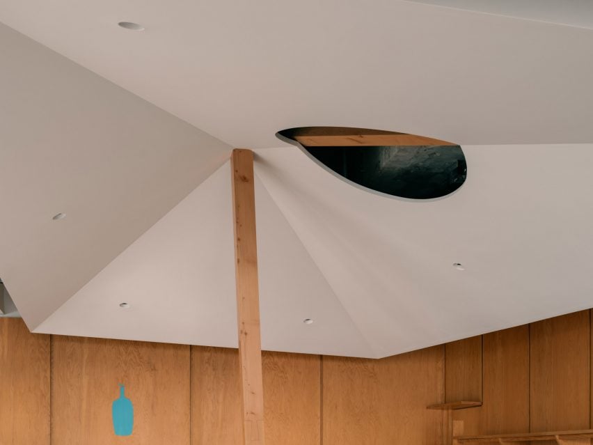 Hole in ceiling of Shanghai coffee shop