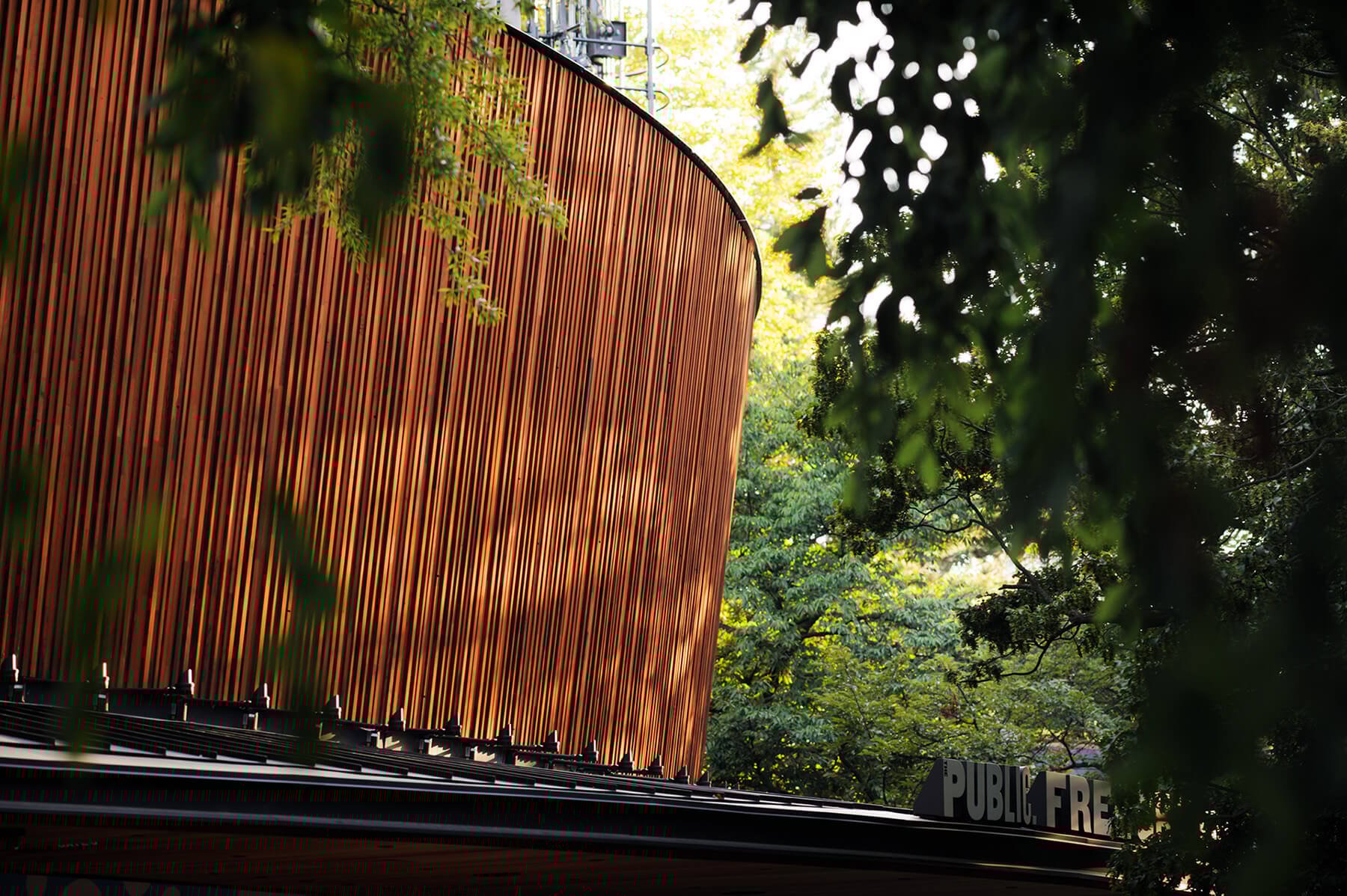 Wooden facade of Delacorte Theater, theater nested in trees