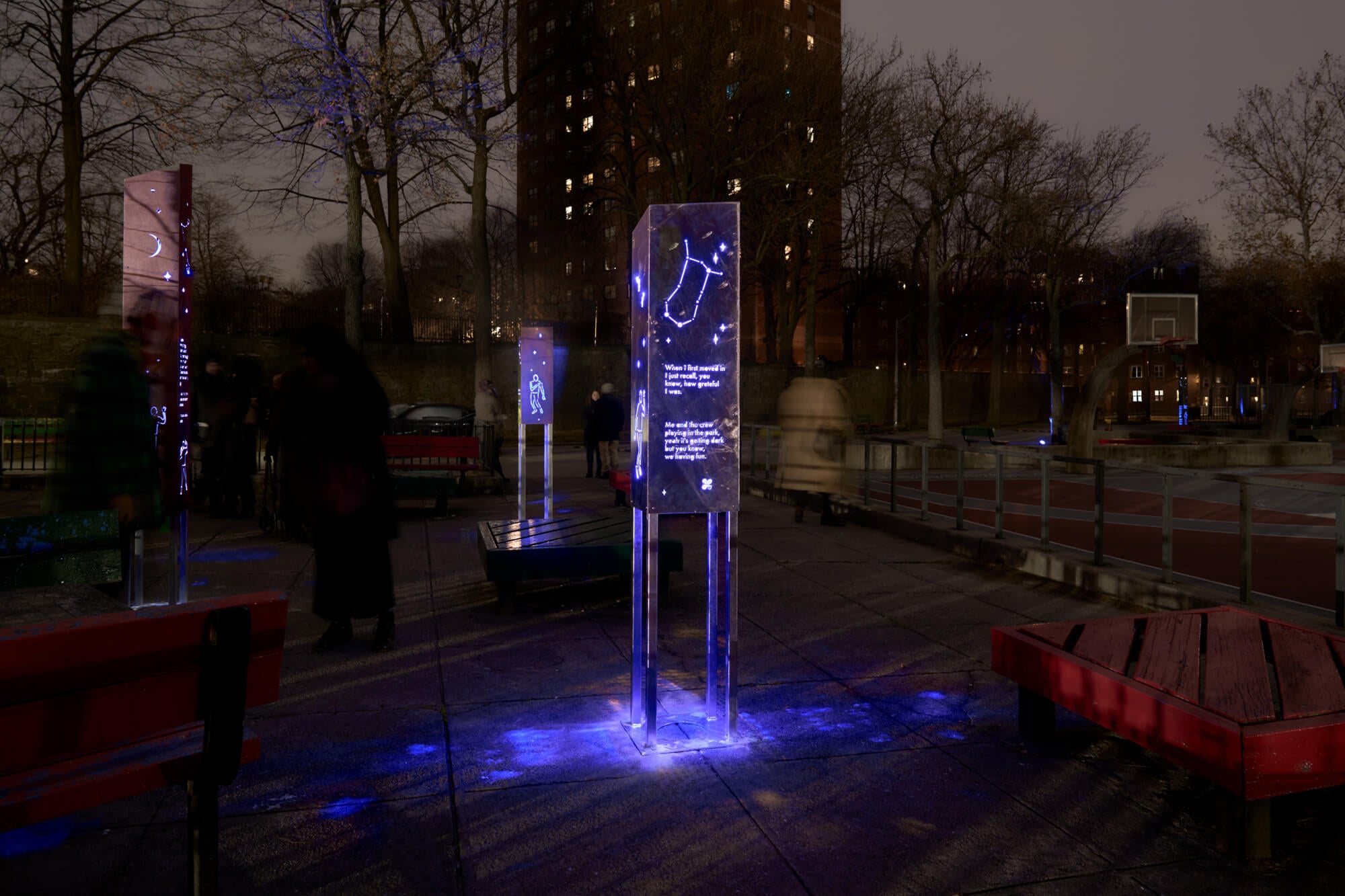 The sculptures at night, lit from within