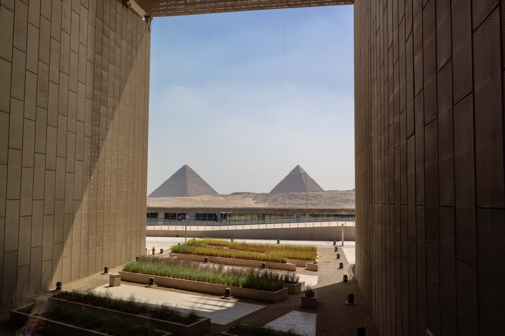 view of pyramids in distance out a window