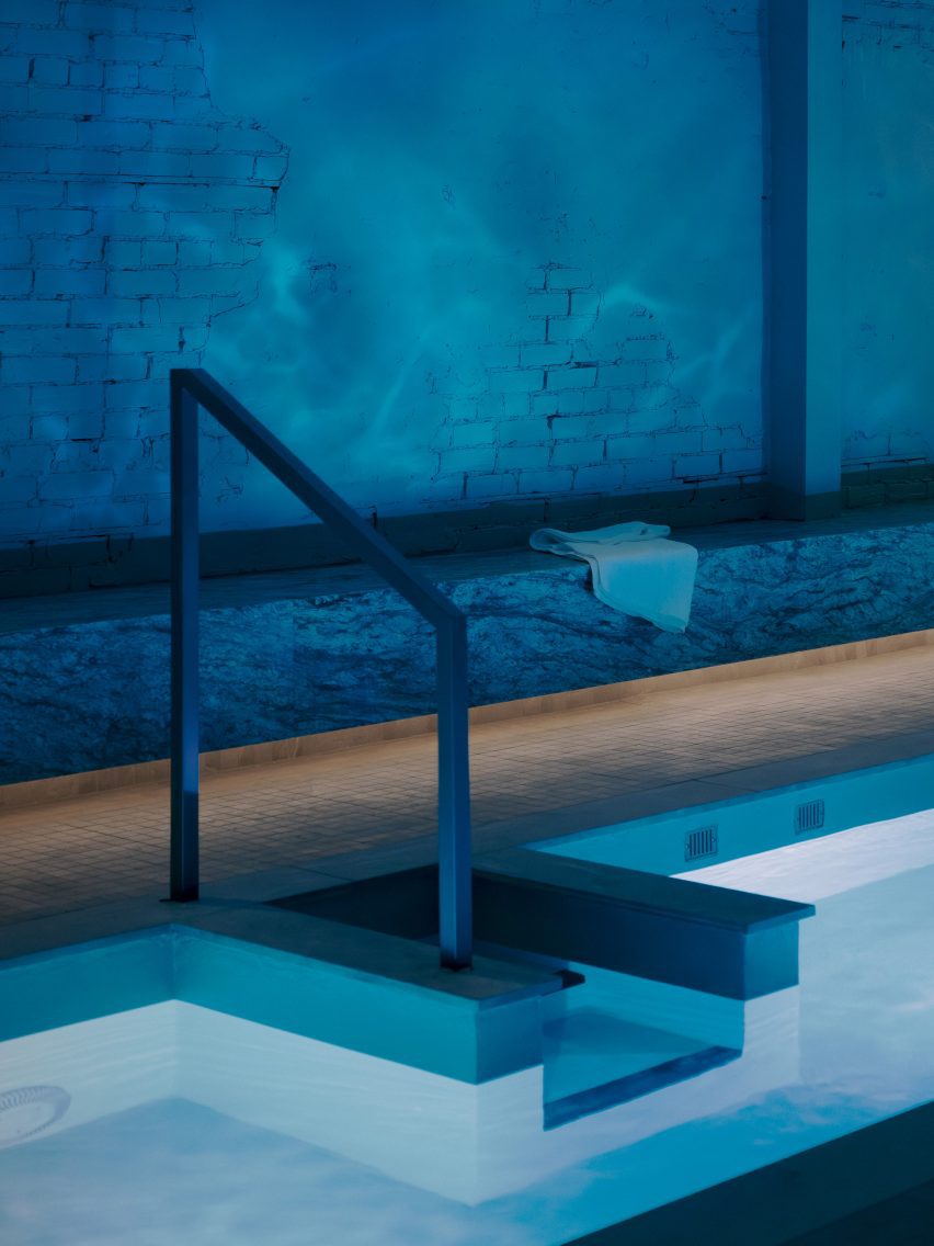 Cold plunge pool illuminated with blue lighting