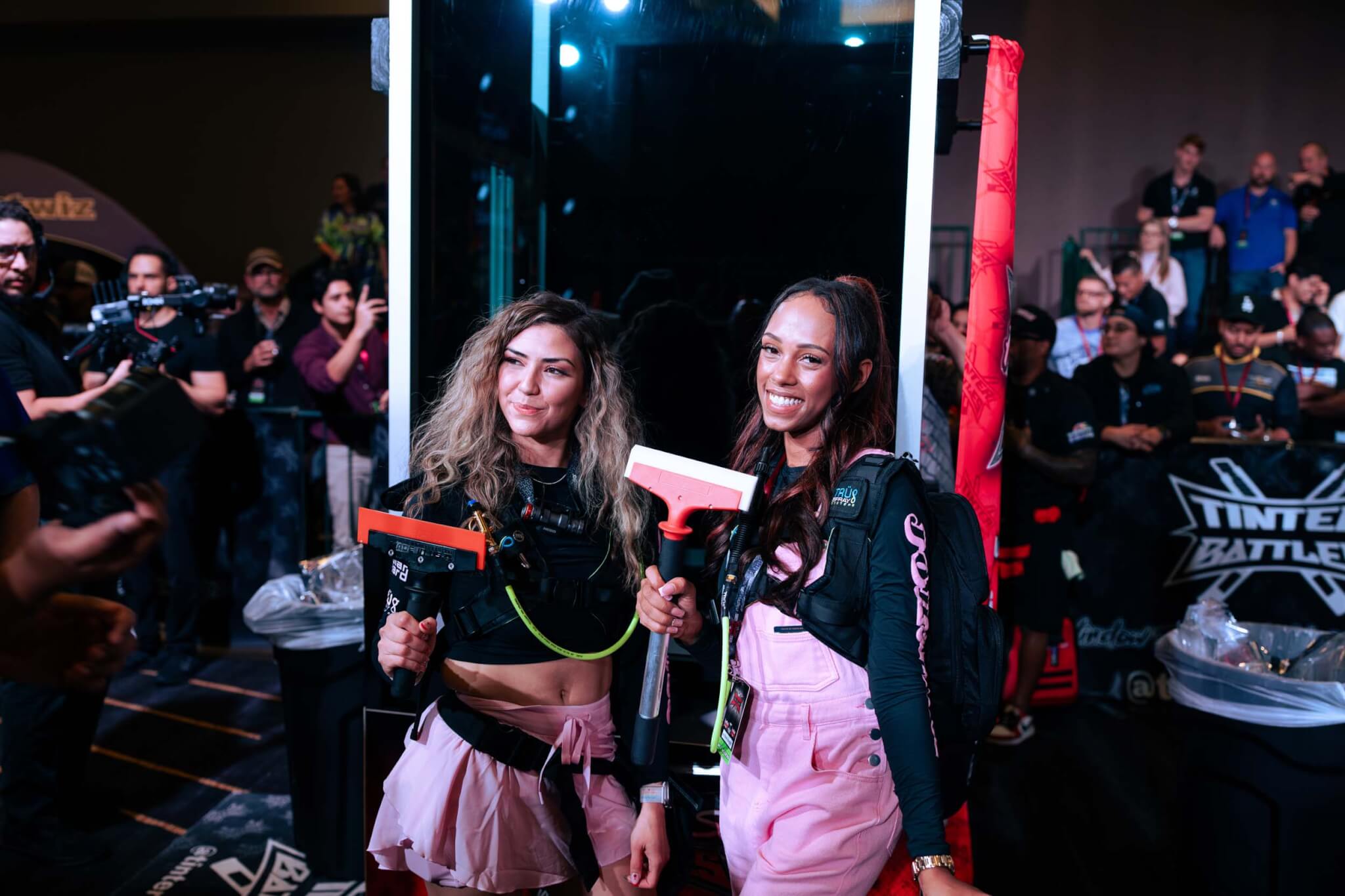 two girls with squeegees