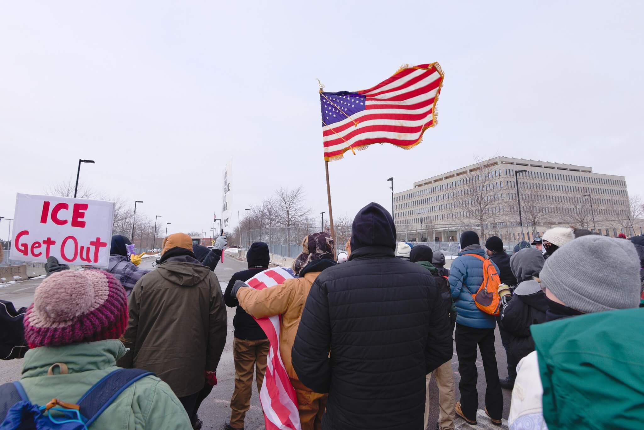 a protest outside the ice headquarters building in minneapolis