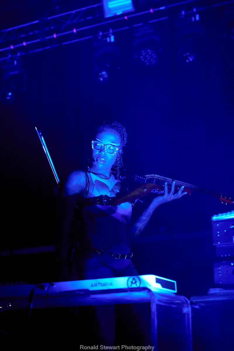 Sudan Archives appears on stage.