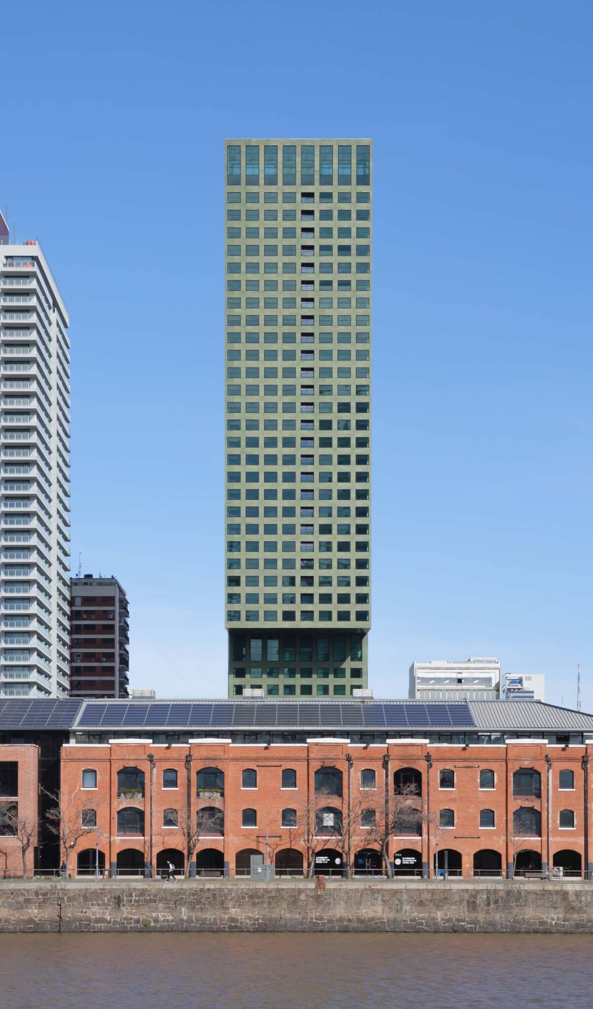 The 39-floor building’s silhouette is marked by a 37-foot overhang
