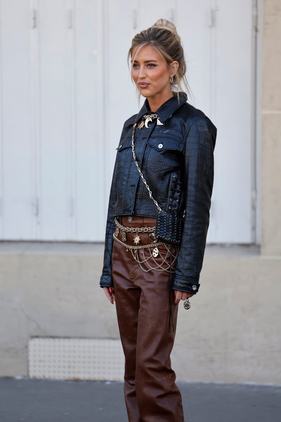 Street Style - Paris Fashion Week - Womenswear Fall/Winter 2025/2026 - Day Four