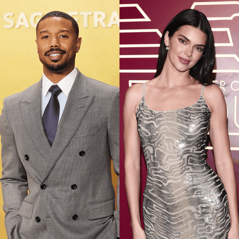 Two individuals posing for a photograph at an event.